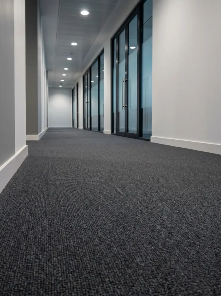 Durable commercial flooring designed for high-traffic work environments and corporate corridors