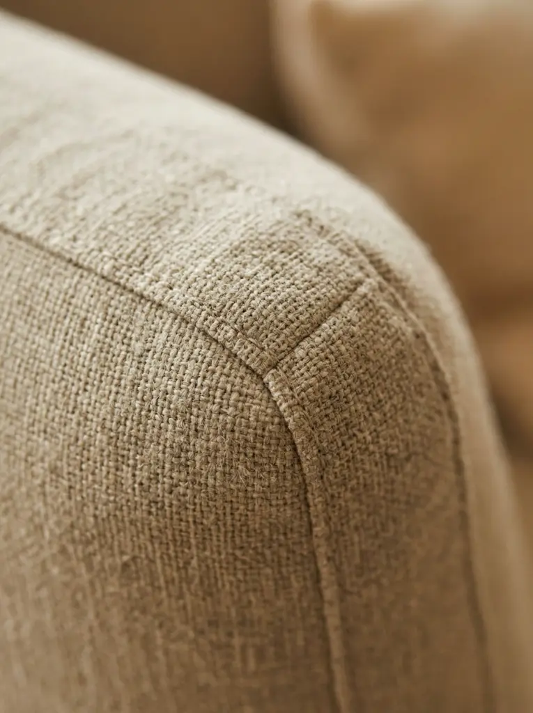 Close up detail of premium fabric on a bespoke sofa.