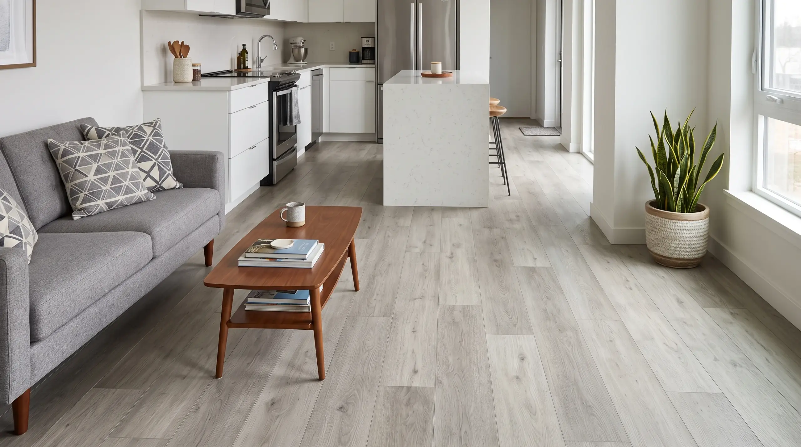 SPC flooring creating a continuous look across a small Dubai apartment